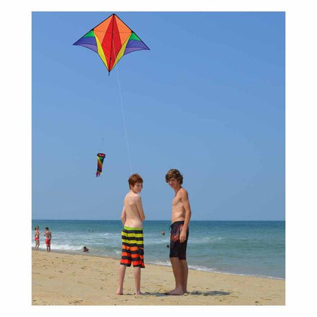 58" Gyro Delta Kite | Rainbow flying on beach with colorful spinning windsock and two boys holding the kite string