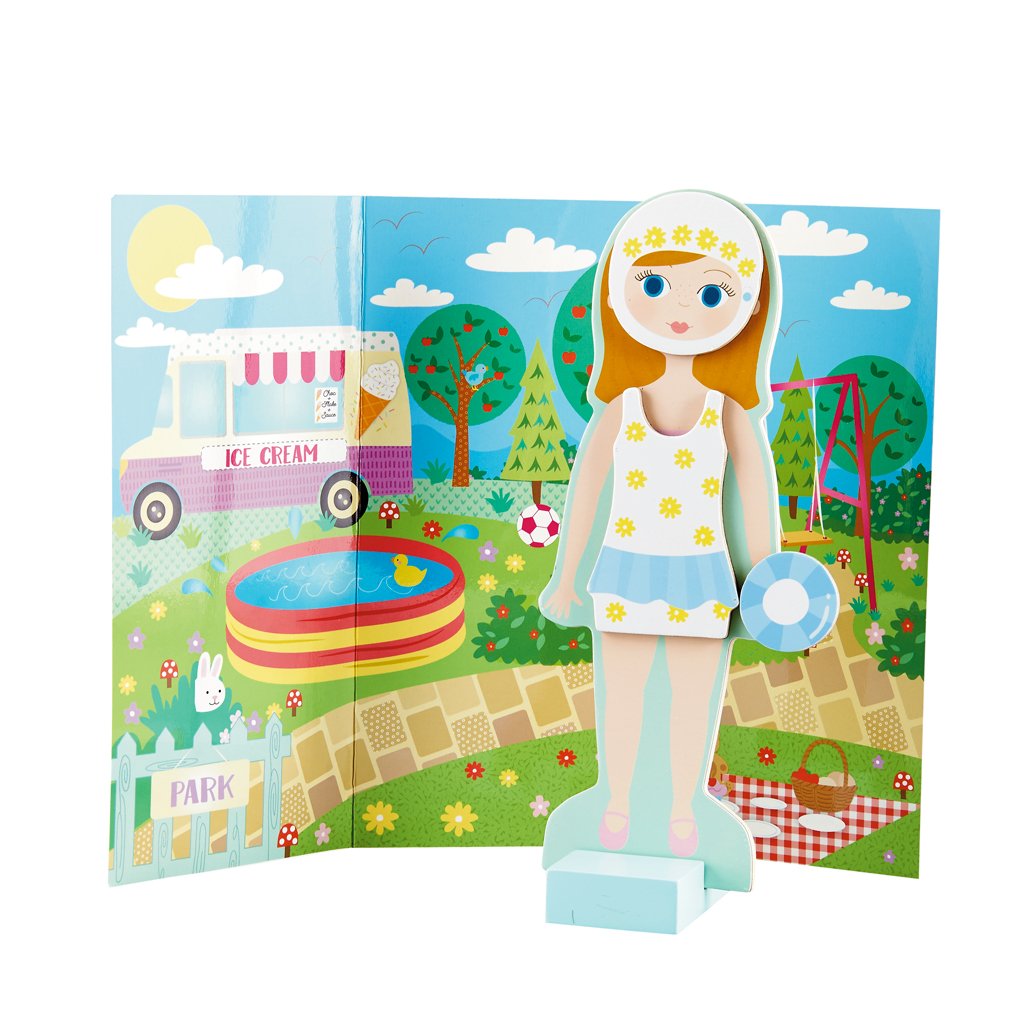 Magnetic Dress Up | Elsie wooden doll with magnetic swimming outfit and fold-out park background scene.