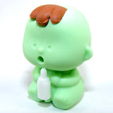 Japanese Eraser Baby holding a white bottle, made in Japan, colorful eco-friendly puzzle eraser toy collectible.