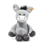 Donkey Dinkey plush toy sitting, gray soft fur, smiling face, safety eyes, and signature "Button in Ear" tag.