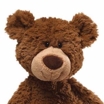 Teddy Bear Pinchy plush in brown with big smile, floppy arms, and corduroy nose accent, 17-inch soft cuddly toy.