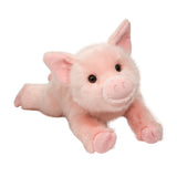 Pig Charlize plush toy in soft pink with luxury fur, floppy body, large ears, curly tail, and playful dark eyes.