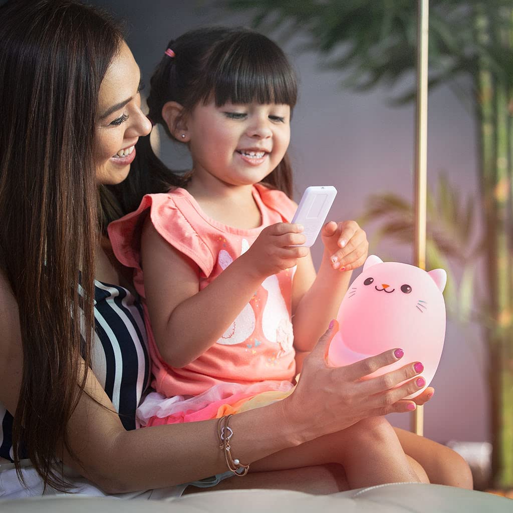 LED Nightlight | Cat with glowing pink light held by a smiling child and mother using a remote control.
