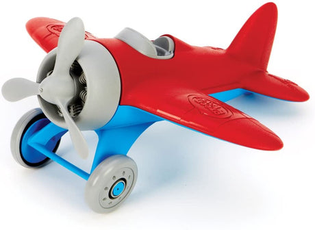 Airplane toy with red wings, blue body, spinning propeller, and two-wheeled landing gear for imaginative play.
