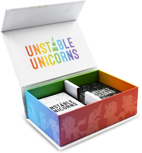 Unstable Unicorns strategic card game box open showing colorful interior and two decks of cards inside.