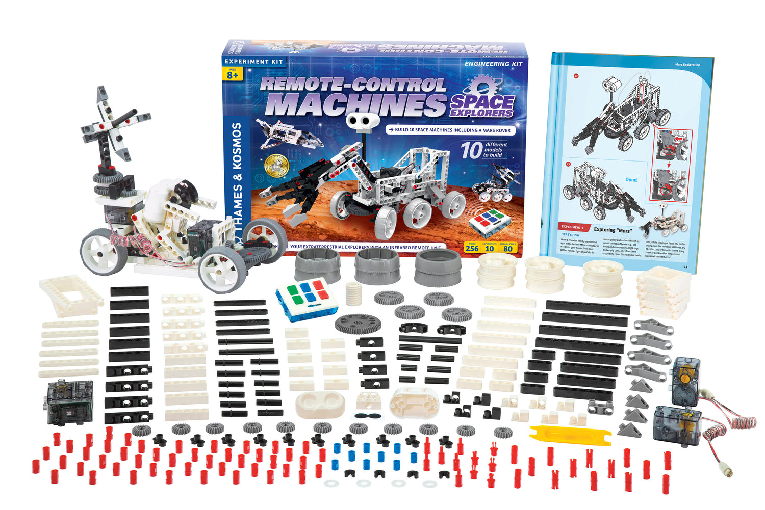 Remote Control Space Explorers kit with parts, instructions, and assembled robotic rover model for space exploration.