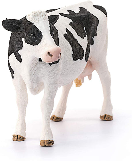 Holstein Cow model showing detailed black and white markings standing on a white background, realistic farm animal toy.