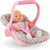 Car Seat Carrier Floral featuring a pink handle and floral fabric holding a baby doll in a cozy seat.
