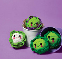 Mini Grocery Store featuring cute clay vegetable characters with smiling faces in small buckets on a purple background.