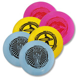 Colorful Frisbee Pro Classic discs with bold black artwork, perfect for outdoor play at the beach or park.