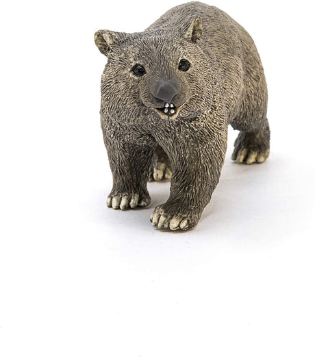 Wombat figure with grey-brown fur, large head, and short legs, realistic marsupial toy for children.