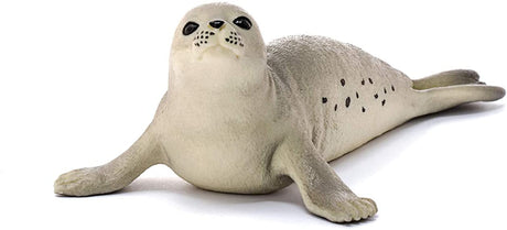 Seal plush toy lying down, soft gray with black spots, realistic design, perfect for kids aged 3 to 8 years.