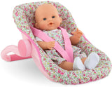 Car Seat Carrier Floral with pink floral fabric and baby doll seated comfortably with safety straps.