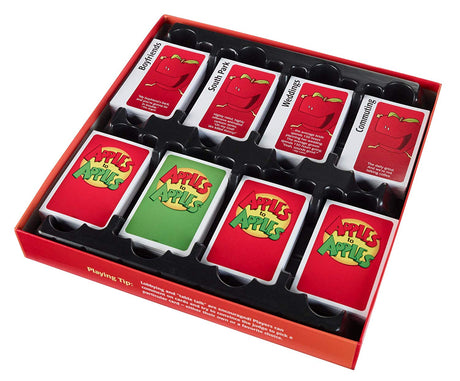 Apples to Apples card game box with red and green cards neatly arranged inside a red tray.