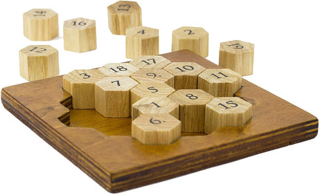 Aristotle Number Puzzle wooden brainteaser with numbered hexagonal pieces on a wooden board for logic challenge.