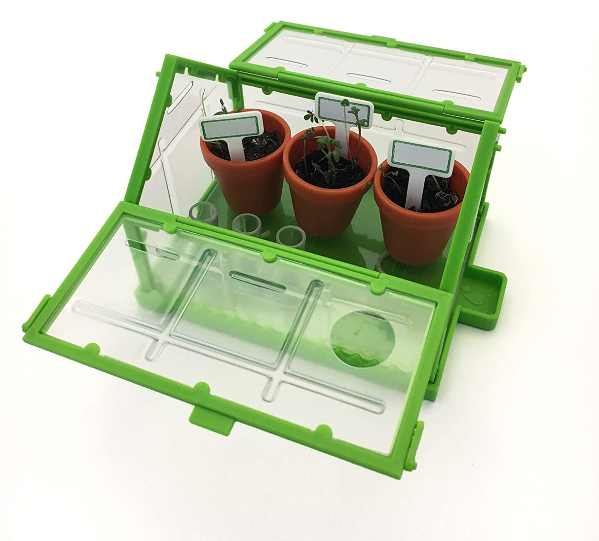 Tiny Tools Tiny Gardening miniature greenhouse with tiny pots, seedlings, and gardening markers for indoor plant growing.