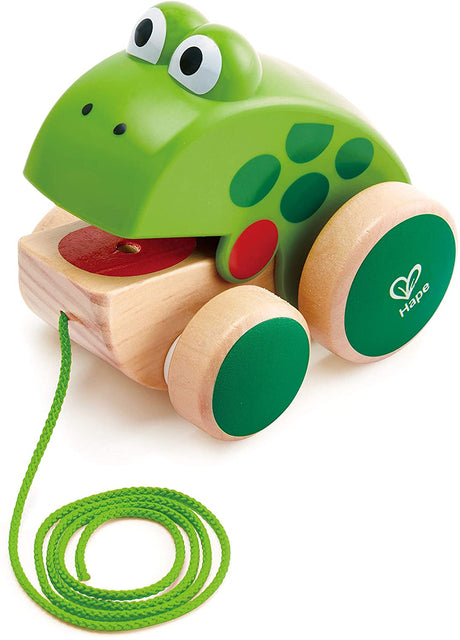 Pull Along Frog wooden toy with green smiling frog and movable mouth on wheels for toddlers 12 months and up.
