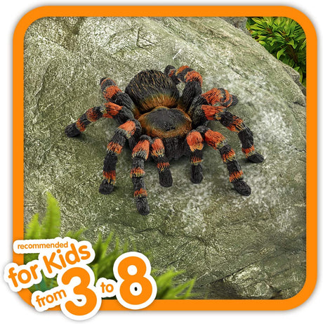 Tarantula toy figurine on rock, detailed and realistic, perfect for imaginative play for kids aged 3 to 8.