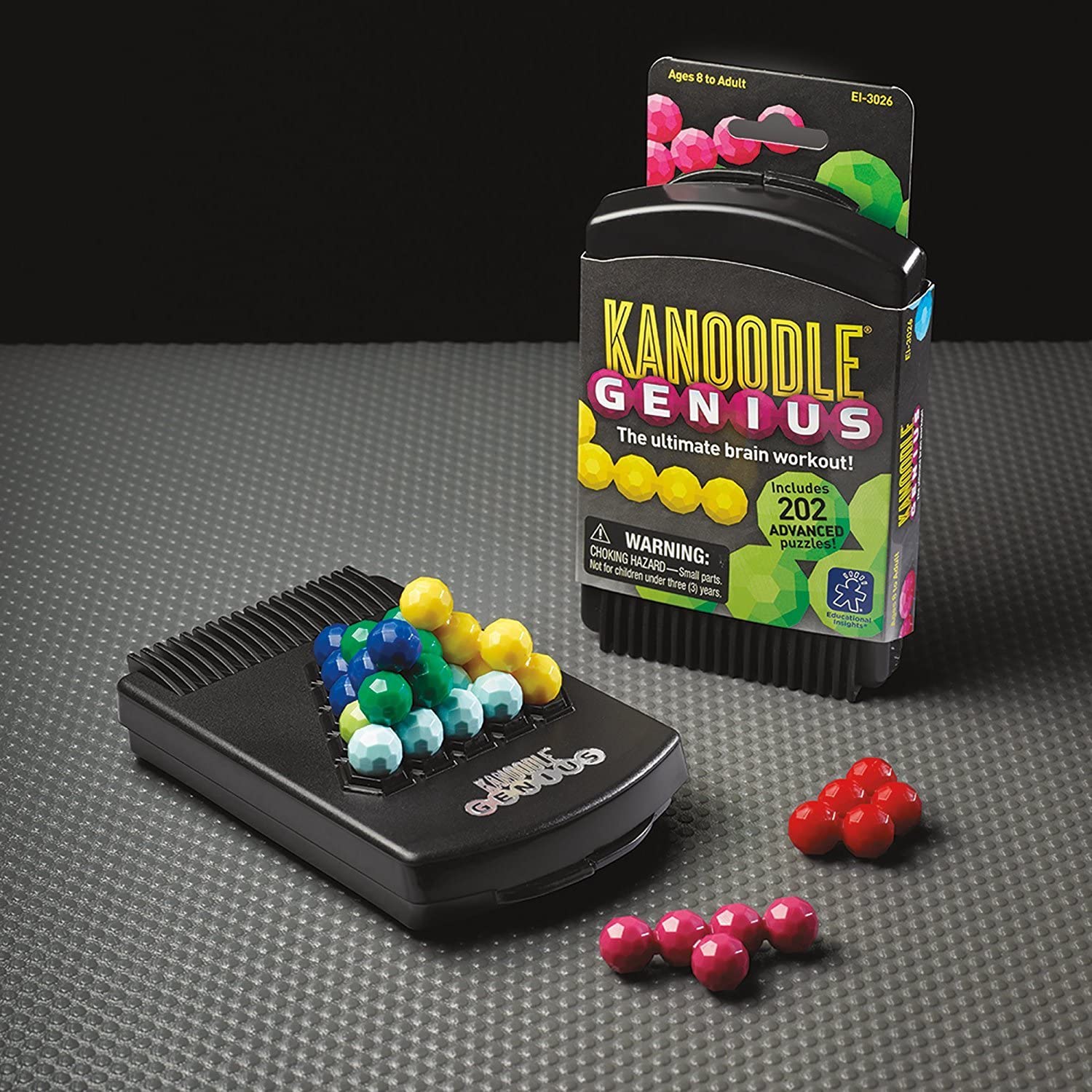 Kanoodle Genius puzzle game with colorful pieces, 202 advanced challenges, and a compact black carrying case.