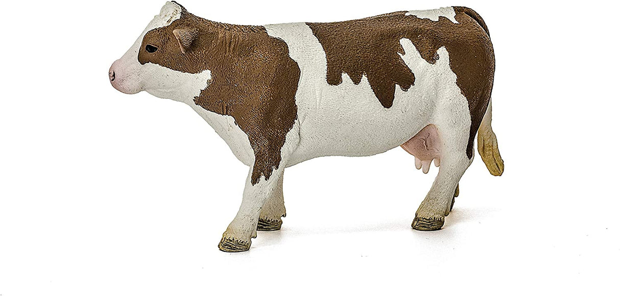 Simmental Cow figurine with white head, legs, and belly, featuring light gold to reddish brown patches.