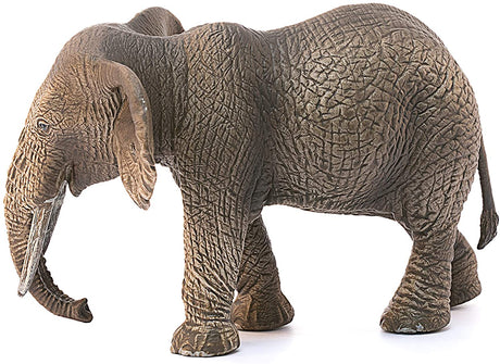 Elephant African Female figurine showing detailed textured skin and realistic elephant shape standing on all fours.