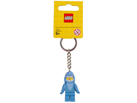 Lego KeyLight Shark Suit Guy keychain with minifigure in blue shark suit attached to metal ring and chain on yellow LEGO card.