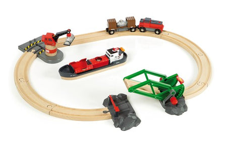 Cargo Harbor Set featuring a wooden train track, cargo ship, crane, and battery-operated train for imaginative play.