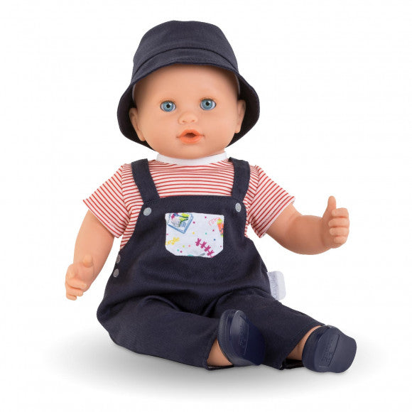 Grand Poupon Augustin doll with blue eyes, navy outfit, sun hat, and vinyl limbs, perfect for cuddling and play.