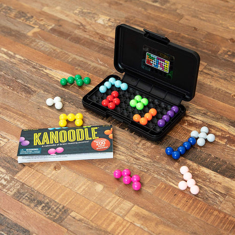Kanoodle puzzle game with colorful connected beads and carrying case for brain-teasing 2D and 3D challenges.