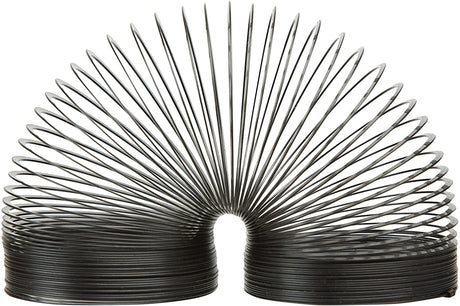 Black metal Slinky stretched in a wave shape, showcasing the Slinky Collector Edition's classic design.