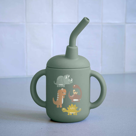 Fresh & Messy Sippy Cup | Baby Dinosaur with two handles, silicone straw, and playful dinosaur graphics for kids.
