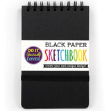 Black Paper Sketchbook with a DIY cover, spiral-bound for easy use with 75 perforated black acid-free sheets.