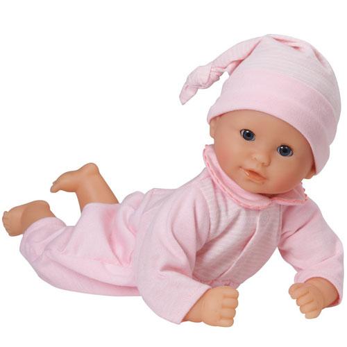 Calin Charming Pastel doll wearing pink pajamas and bonnet, with soft vinyl limbs and sleepy eyes, perfect for cuddling.