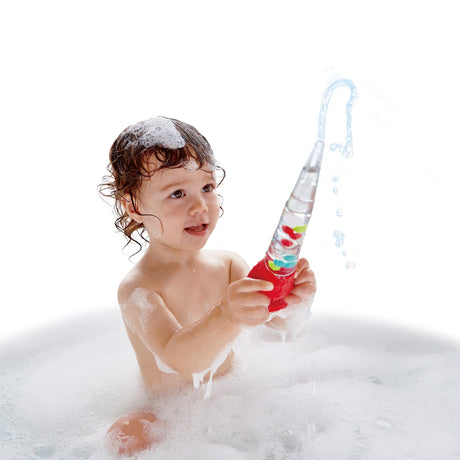 Child playing with Squeeze & Squirt bath toy, squirting water and enjoying bubbles during bath time fun.