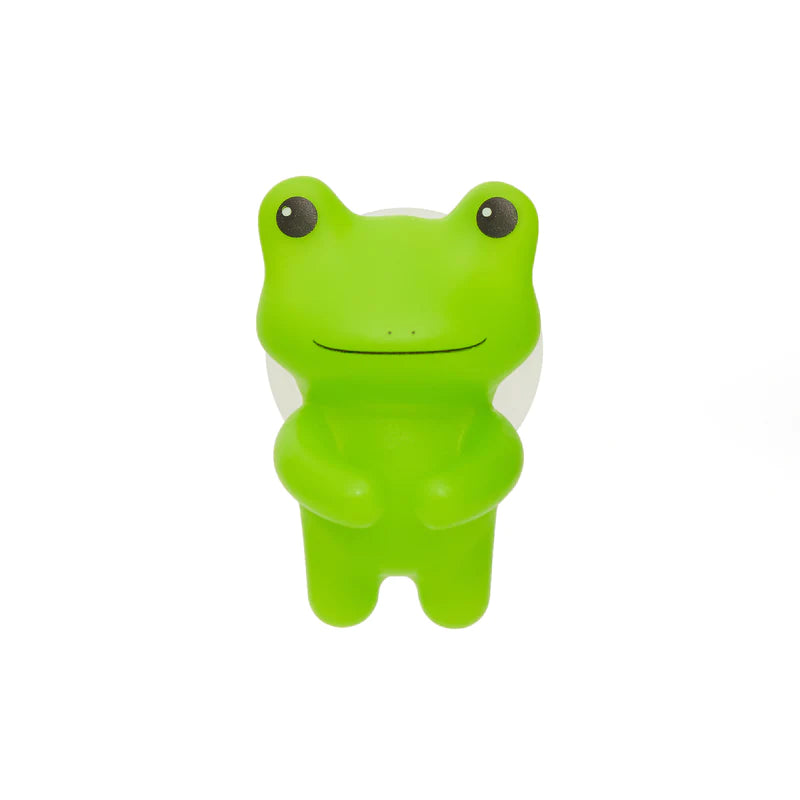 Toothbrush Holder | Frog in bright green with suction for holding toothbrushes on smooth surfaces.