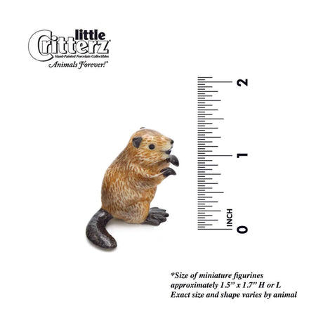 Critterz Beaver Paddle miniature porcelain figurine measuring 1.5 inches, hand painted with detailed beaver features.