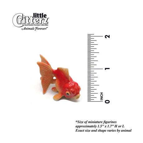 Critterz Goldfish Fancy miniature porcelain figurine next to ruler showing size approximately 1 inch tall.