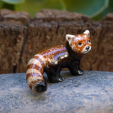 Critterz Red Panda Firefox miniature porcelain figurine hand painted with detailed red panda colors and markings.
