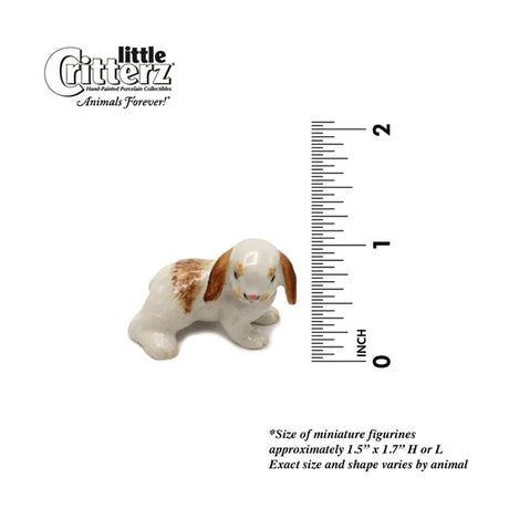 Critterz Brown & White Bunny Charlie miniature porcelain figurine beside a ruler showing size under 2 inches.