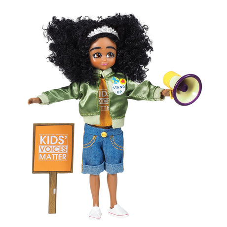 Lottie Kid Activist doll with curly hair, green bomber jacket, denim shorts, megaphone, and Kids Voices Matter sign.