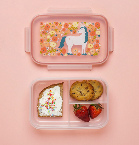 Good Lunch Bento Box | Unicorns with floral design, three compartments holding snack, dessert, and fruit on pink background.