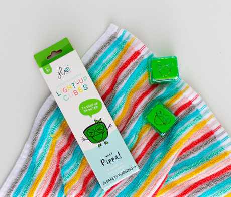 Glo Pals Green light-up cubes with Pippa character on colorful striped towel for kids ages 3 and up.