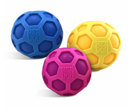 Three colorful Atomic Nee Doh fidget balls in blue, yellow, and pink with honeycomb texture on a white background.