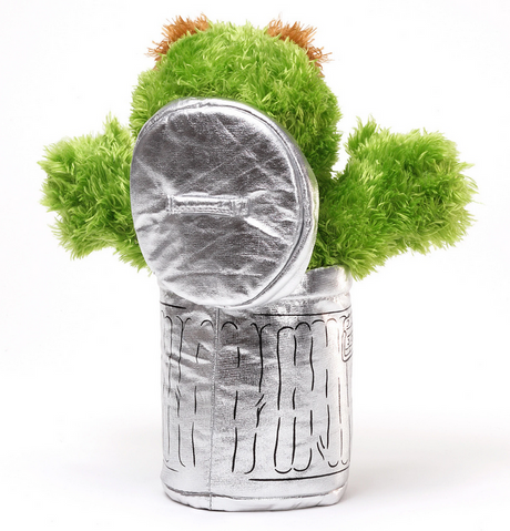 Oscar the Grouch plush toy from Sesame Street in a silver trash can with green fur and orange eyebrows.