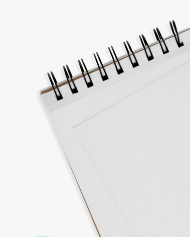 White Paper Sketchbook with spiral binding and perforated white sheets ideal for drawing and coloring.