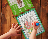 Child using the Water Wow Farm paint-with-water coloring book with reusable farm scenes and refillable water pen.