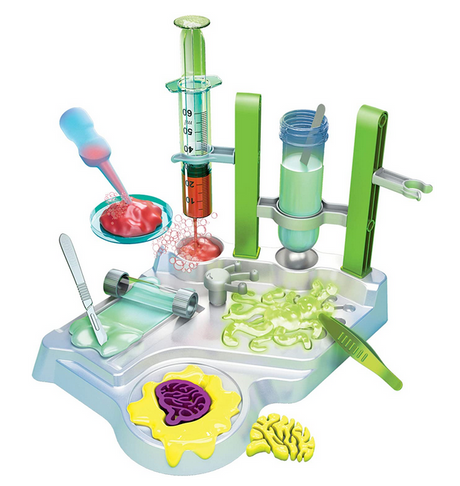 Ooze Labs Alien Slime Lab with tools like syringe, roller, scalpel, and tweezers for slime experiments and alien ooze research.