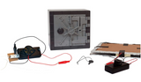 Ultimate Spy Vault & Code Kit showing assembled vault, electronic door alarm, and pressure plate components for spy activities.