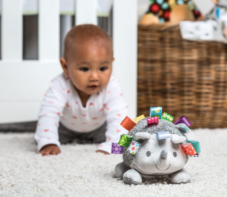 Taggies Heather Hedgehog Soft Toy with colorful ribbons and embroidered details, perfect for babies and toddlers playtime.