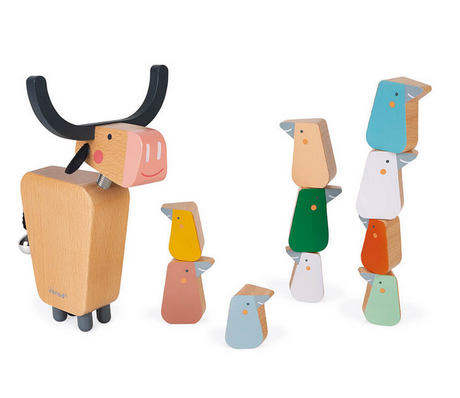 Balancing Water Buffalo wooden game with pastel birds stacked carefully to test skill and patience for children aged 3 and up.